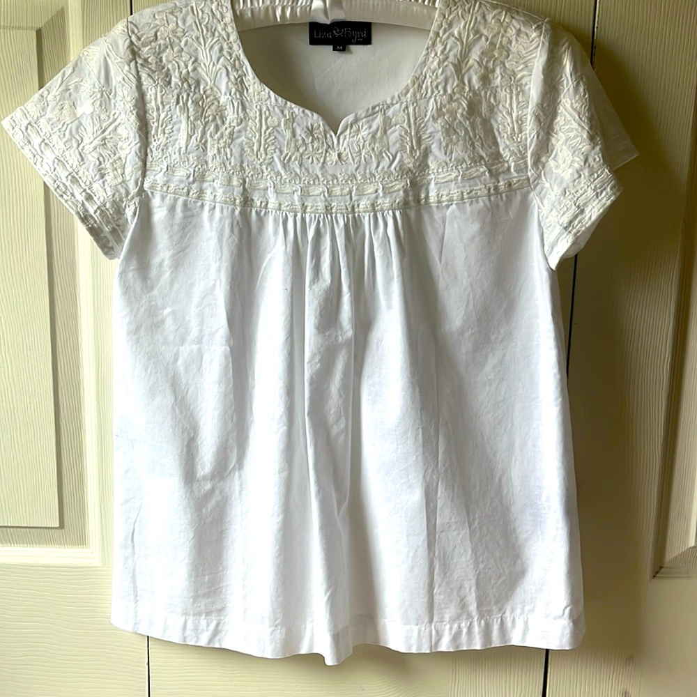 Liza Byrd embroidered white on white tunic.